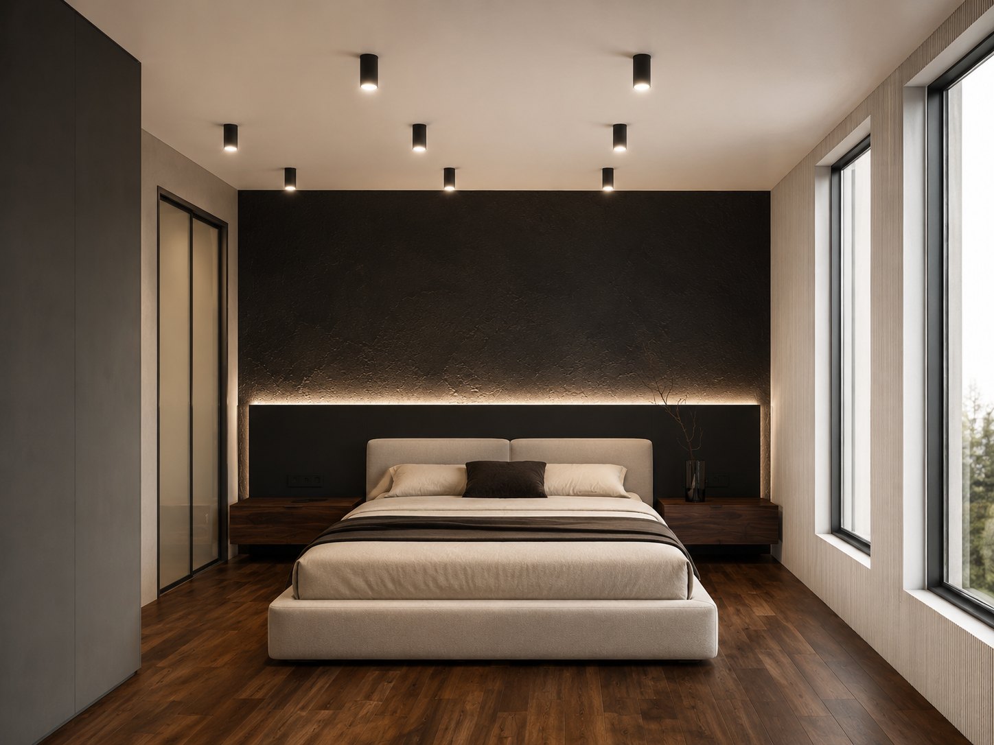 Primary bedroom with a dark headboard wall and windows to the trees
