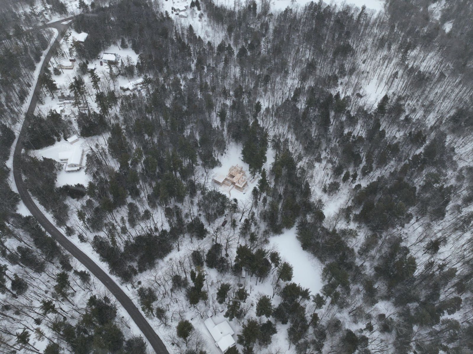 Winter aerial of the Hunter site and driveway