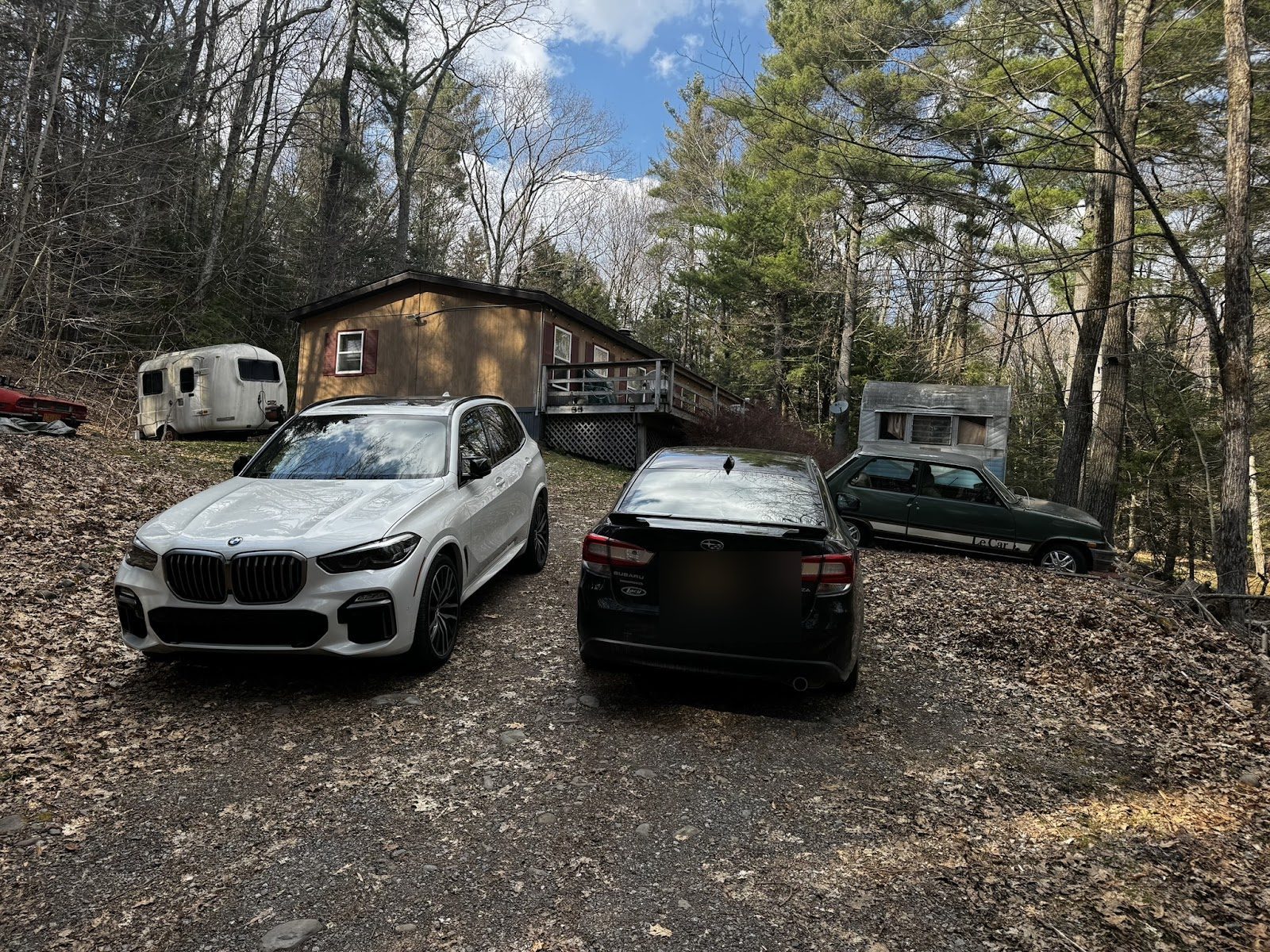 Existing house at the end of the driveway