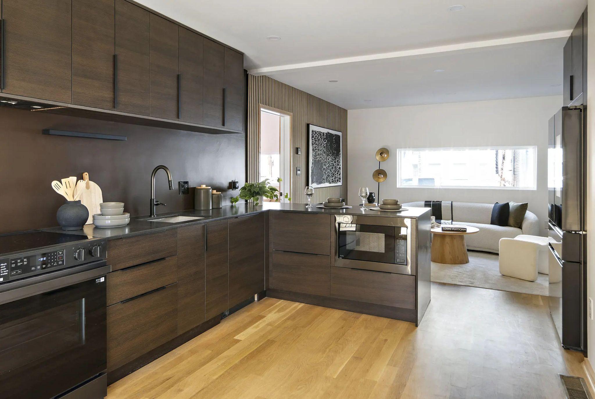 Kitchen opening into the living room