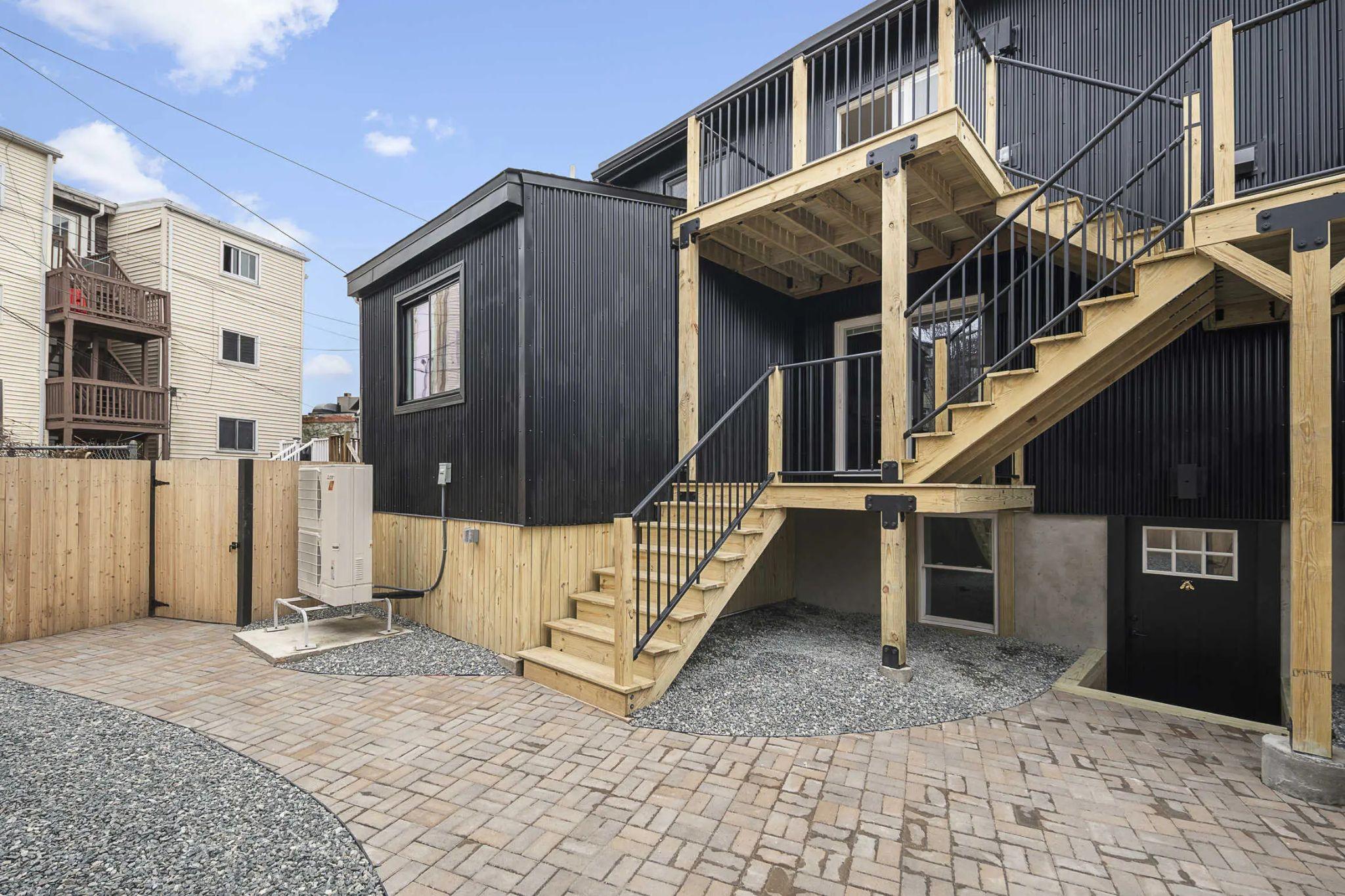Rear stairs and decks for both residences